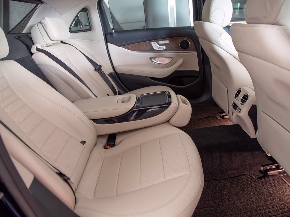 Interior view of a car featuring leather seats, highlighting the upholstery's elegance and style.